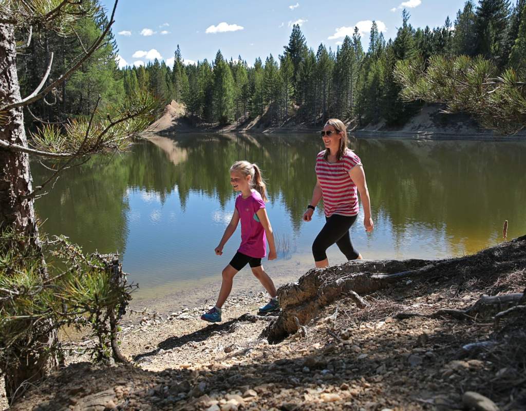 Helen and daughter walking Naseby Forest