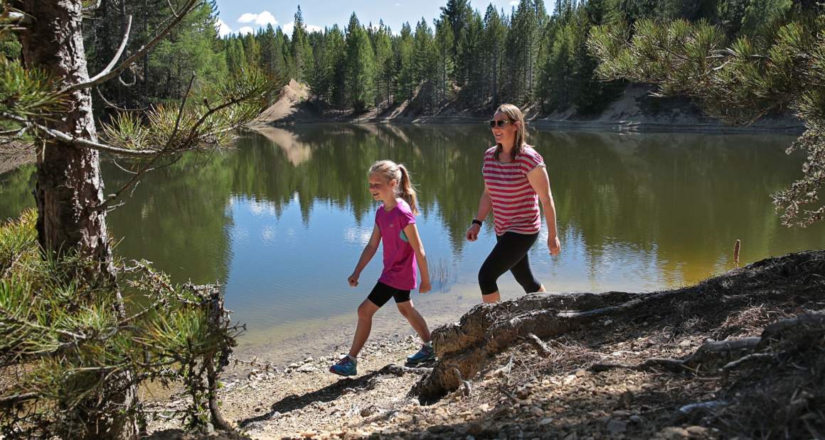 Helen and daughter walking Naseby Forest