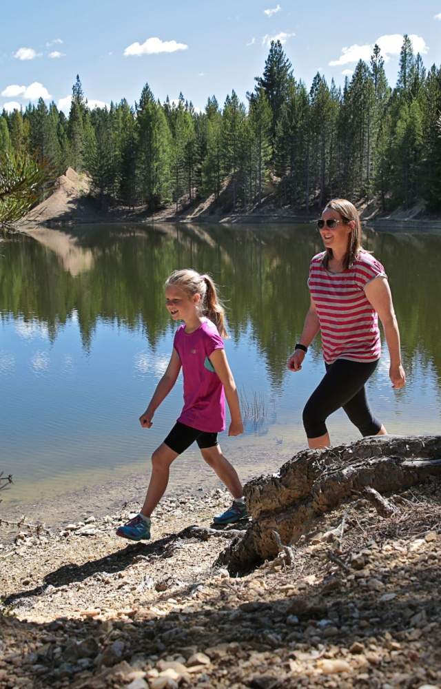 Helen and daughter walking Naseby Forest